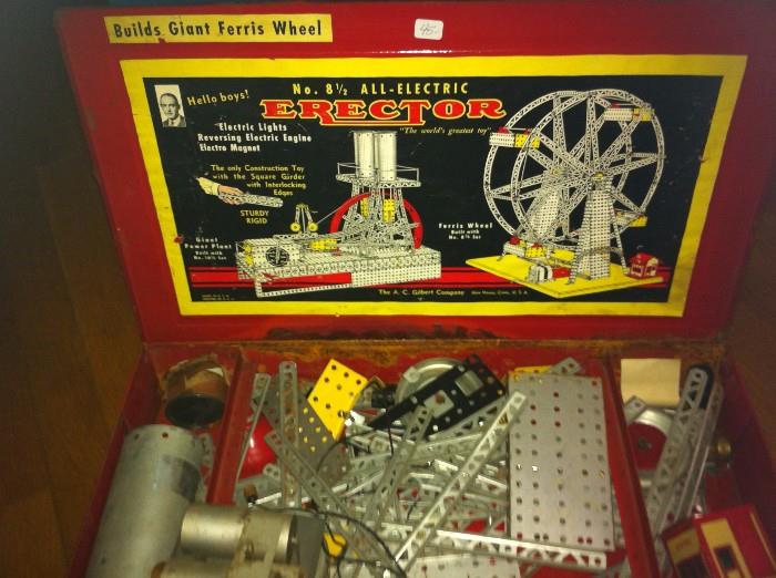 Many antique and vintage toys are available for purchase. For example, this 1950 A.C. Gilbert Erector set, Mayflower truck, DC Comic Books, a 1976 Super Jock basketball toy and many others.
