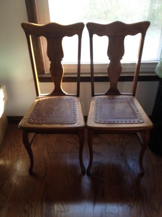 Pair of Leather/Oak seat dining room chairs