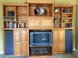 This is a large custom oak entertainment center. Priced to sell!! Comes apart for easy moving and under 8 feet.