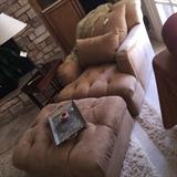 Great tufted chair and ottoman in a camel moro suede