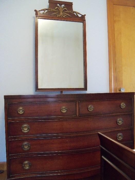 mahogany dresser. ornate mirror