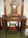 Ingraham Clock. Original parts. Chimes on the hour and 1/2 hour. Has the key.
Singer treadle sewing machine. Just needs a new belt. c. 1910. Go Green!