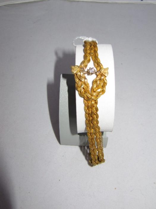 18-22k gold bracelet with .20 point diamond,  circa 1880  culett (point) slightly chopped (standard practice years ago) repairs to bracelet,
16 grams including stone,  Transitional European cut to Modern
Custom hand made
