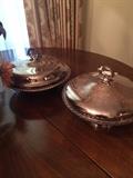 Two of several silver plate serving pieces