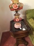 One of two matching end tables; antique lamp