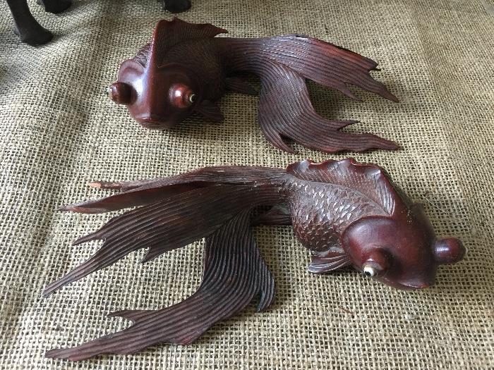carved rosewood fish figurines