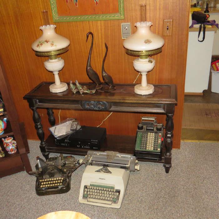 Gone with the wind type lamps; vintage typewriters; dvd player; vintage adding machine; sofa table