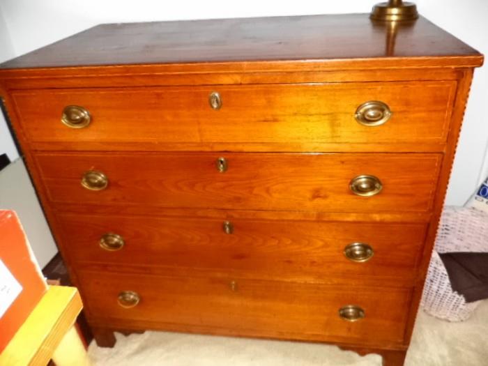 American four-drawer cherrywood chest with string cross band inlay