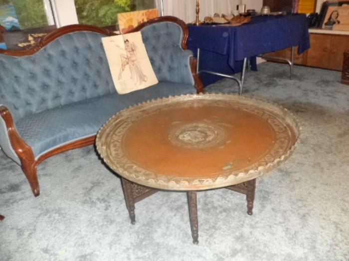 19th century Victorian loveseat with antique Morroccan brass top table