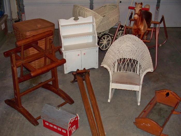 Yarn Winder, Wonder Horse, Wicker Buggy, Wicker Child's Chair, Clothes Dryer, and Children's Toys.
