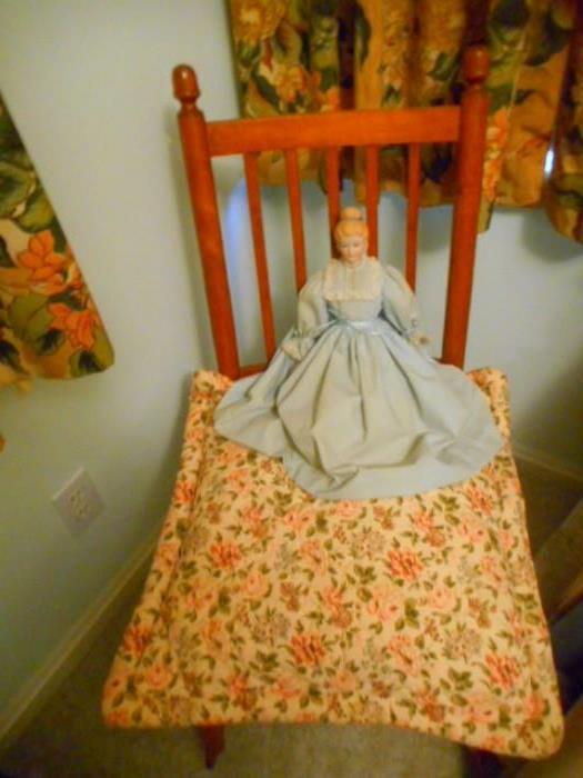 Antique doll and chair