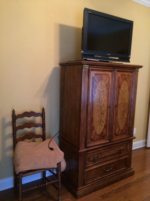 Stanley  armoire  electric blanket, antique chair,   flat screen TV