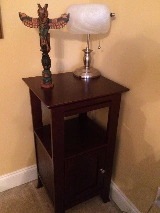 small table with storage, lamp