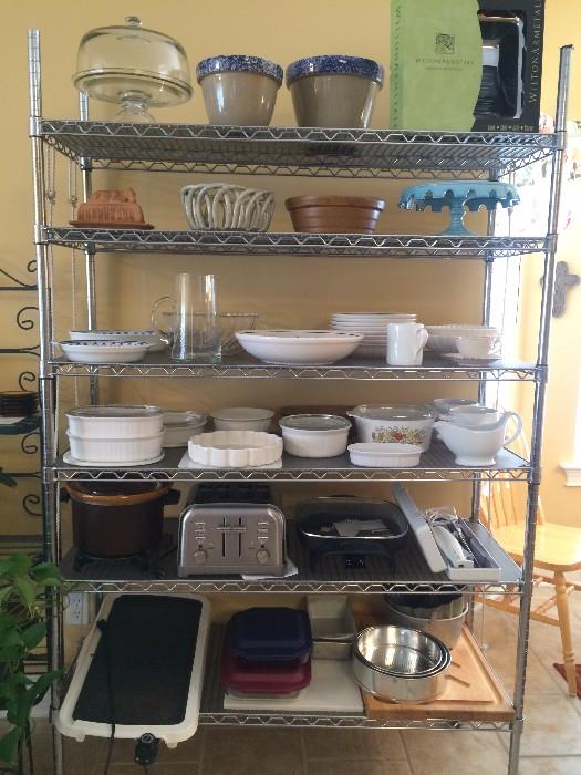 CORNING-WARE , TOASTER, BAKING DISHES , NEW ELECTRIC SKILLET, LOTS OF KITCHEN WARE