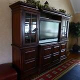Beautiful Liberty Furniture Cherry wood stain Large entertainment center