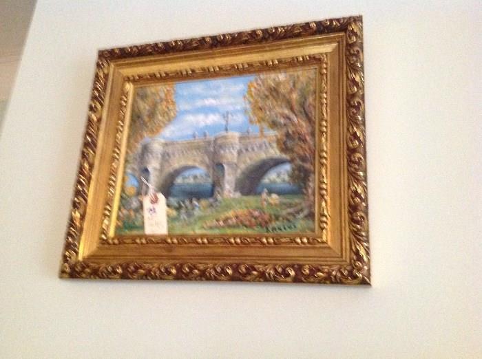 Oil on Board in Frame - 15" t x 18" wide - Vaulted Bridge with floral surrounds.  Signed "Karlus".  Gold pain finished Rococo frame - Appraised Value $ 50.00