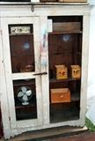 Large white cabinet (other door is present) - Measures 72 in. H x 50 in. W x 16 in. deep.