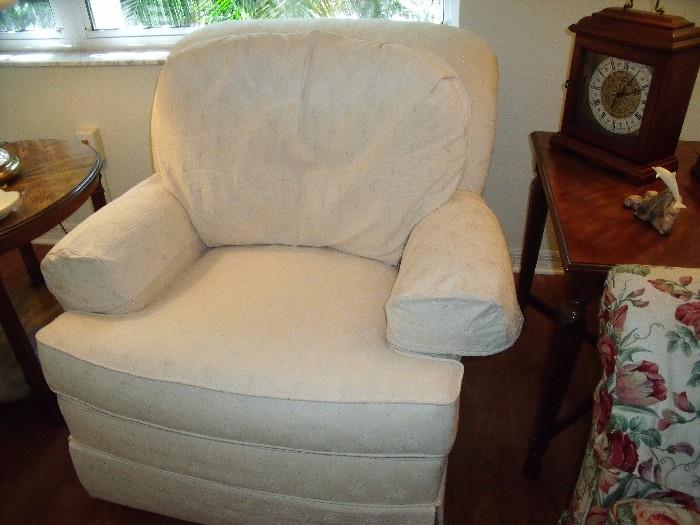 One of pair cream easy chairs