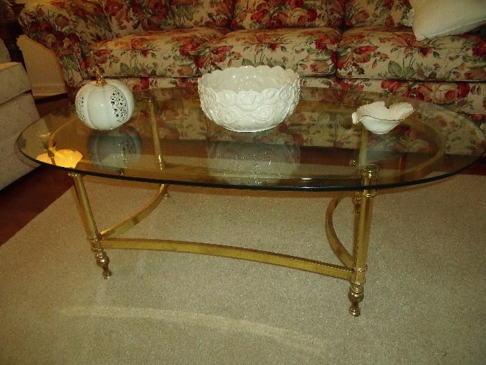 Coffee table with "brass" base