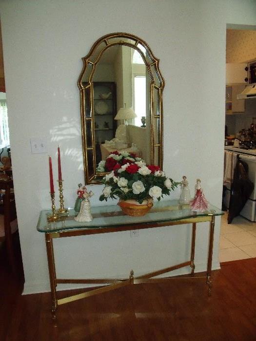 Entry table with "brass" base along with wall mirror