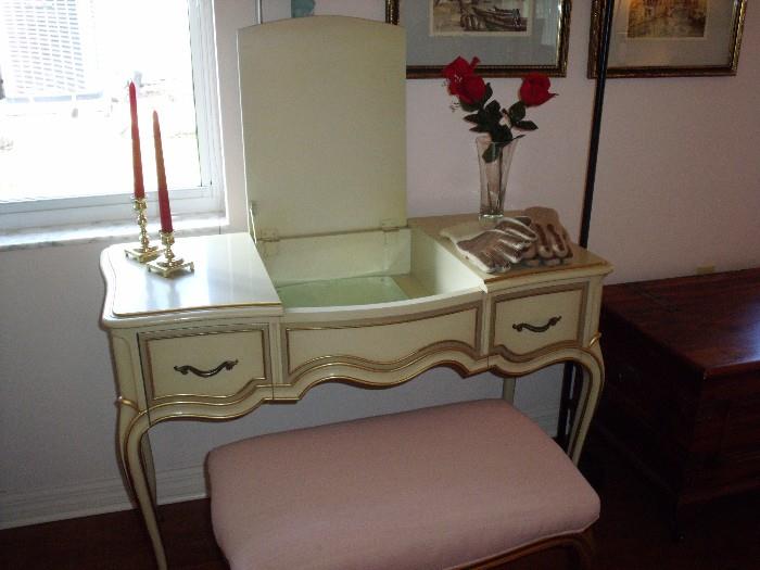 Vanity and bench.  Matches bedroom suite
