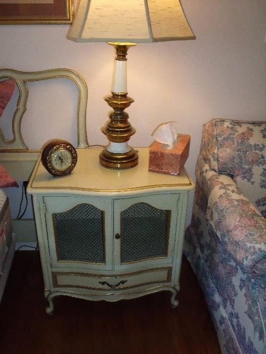 One of two night stands - French Provincial.  Or can be used as a table apart from the bedroom set