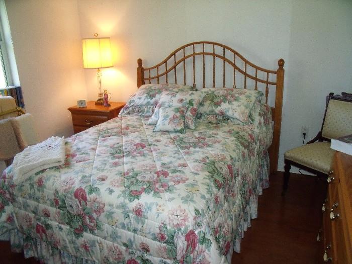 Colonial style medium oak bedroom suite.  Queen/full headboard