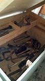 Very large carpenters box, wood construction.  This lot includes the tools.  Note the the saw cradle near the front edge of Box. Sale also includes other cabinets of  wood and metal.
