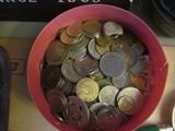 Collection of foreign coins.  Includes a  few 1966 Rands, several large English pennies, a couple other silver coins. 