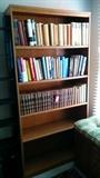 One of a pair of wooden bookcases, this one actually has books in it - how novel!