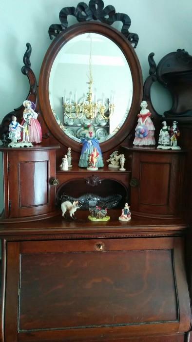 Roayl Doulton figurines: "June", "Veronica" and "A Victorian Lady".                                                                                Also, a collection of "Sebastian Miniatures", designed by Prescott W. Bastom, of Marblehead, MA.                            Perhaps he should have his head examined...