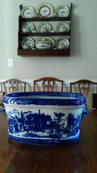 Mahogany hanging shelf, with 24-Piece set of Asian china in yellow/white/peony coloration. Foreground, English porcelain blue/white footbath.