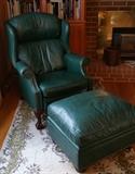 Green leather wingback recliner and ottoman.  Excellent condition
