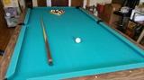 Regulation size pool table.  Excellent condition - felt like new. Slate bottom.   Converts to ping pong table. Pool sticks, rack, balls, and ping pong accessories 