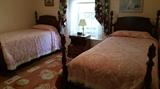 Walnut Twin four poster "acorn" bed with Deerfield Headboard.  Excellent condition, mattresses and box springs