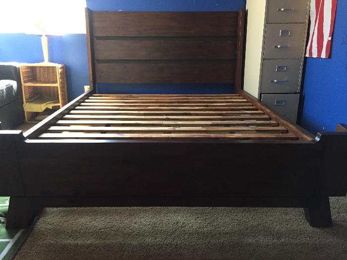 Brand new queen size bed!  Never used and solid! 