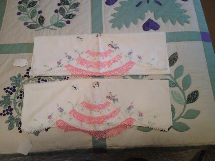 Embroidered and crocheted pillow cases with Southern Belle figures