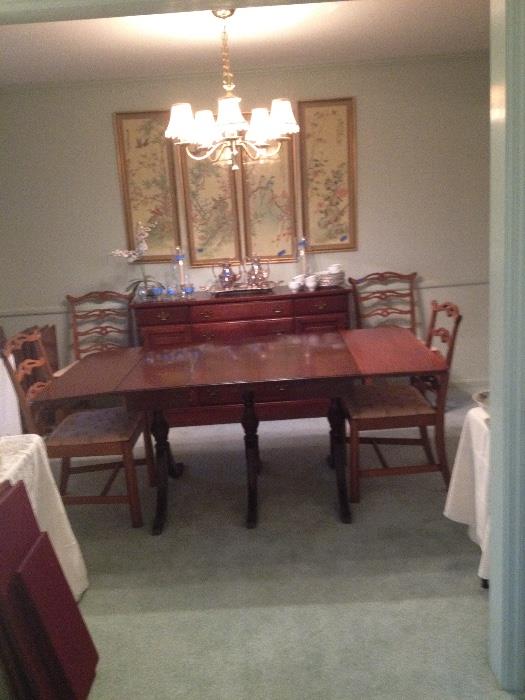 Three pedestal dining table with leaves
