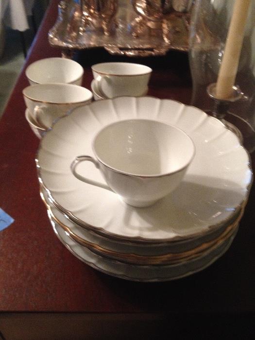 Six porcelain hostess sets with cup and plate