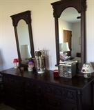 Dresser with 2 mirrors included in 3 pc King bedroom suite.