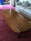 Drop leaf coffee table 4' x 20" with sides down.
