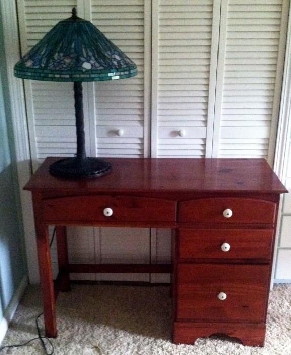 vintage student's desk and Tiffany-style lamp