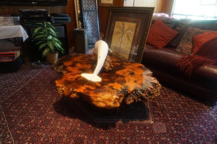 fabulous burl wood coffee table with white whale on top