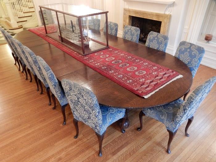 Oak Banquet Table measures 6' wide x 14' long  with 7 leaves. There are 3 more leaves in storage. It measures 6' round with no leaves. 