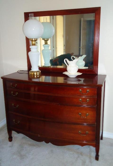 Mahogany bow front chest with mirror