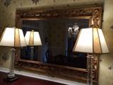 Pair of crystal lamps and large gilt mirror