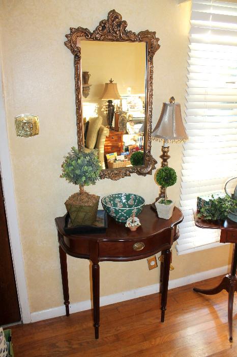 Gilt mirror, Bombay side table, lamp, and decor