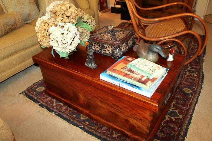 Trunk coffee table with books and decor