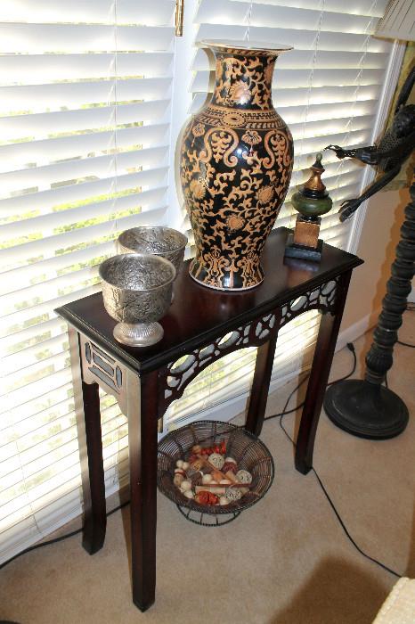 Small side table, Asian vase, and other decorative items
