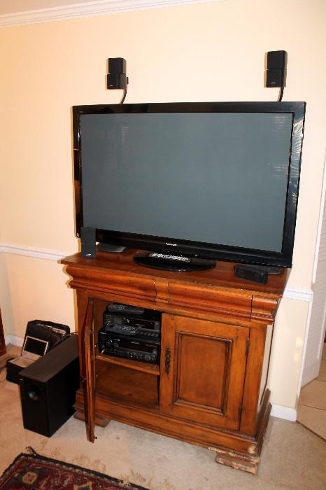 TV cabinet with Panasonic Viera 50" Plasma HDTV, BOSE Acoustimass 10 Series II Home Theater speaker system, and other electronics